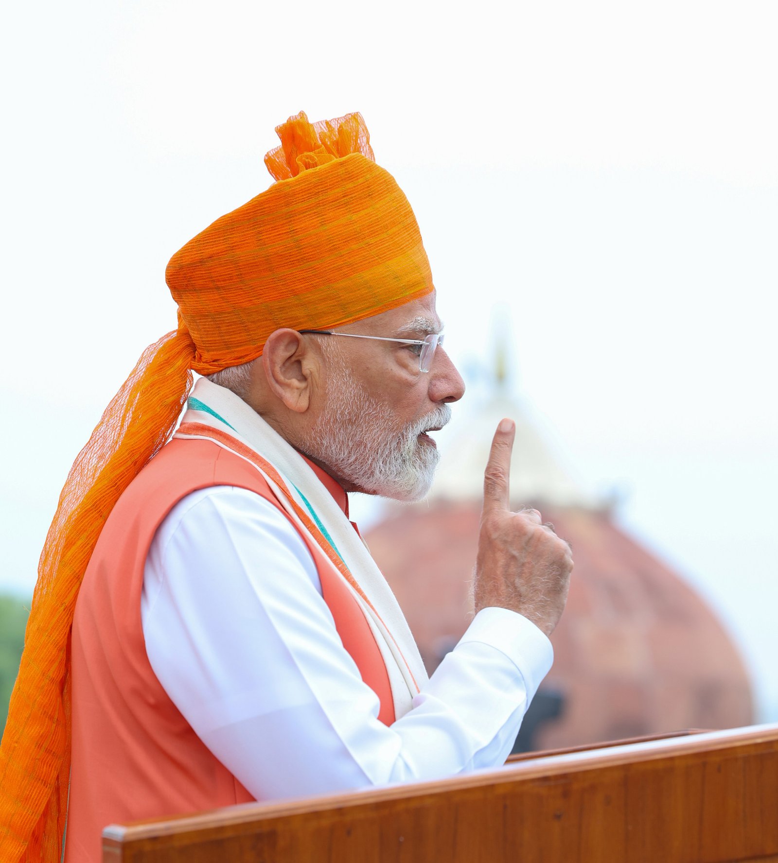 Prime Minister Narendra Modi gesturing during his Independence Day 2025 speech from the ramparts of the Red Fort in Delhi
